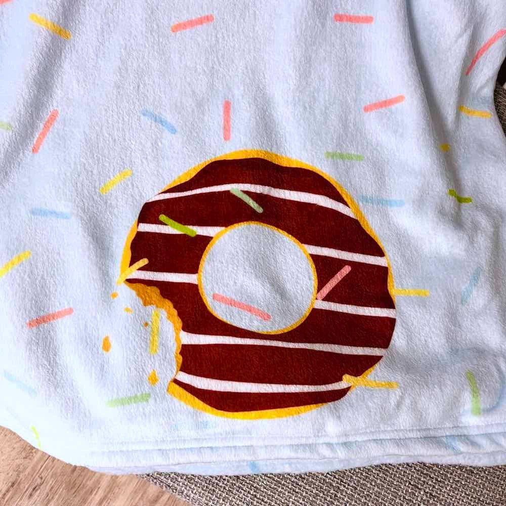 donuts on blue throw blanket