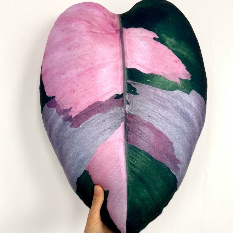 pink plant leaf pillow